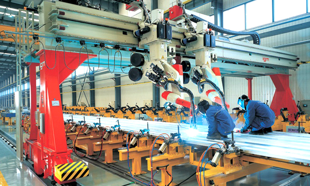Ligne de production automatisée de soudage en aluminium avec système robotique pour la fabrication industrielle